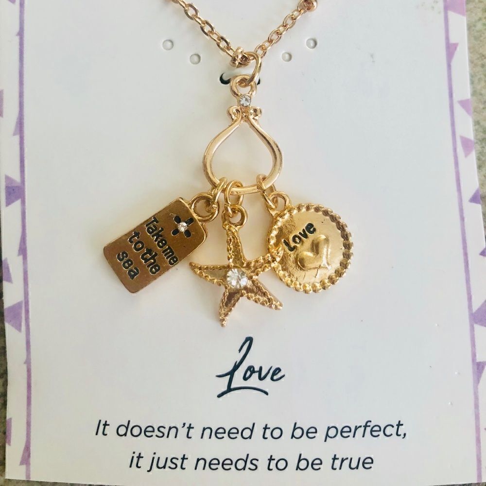 New Love necklace. Gold tone 3 charm starfish